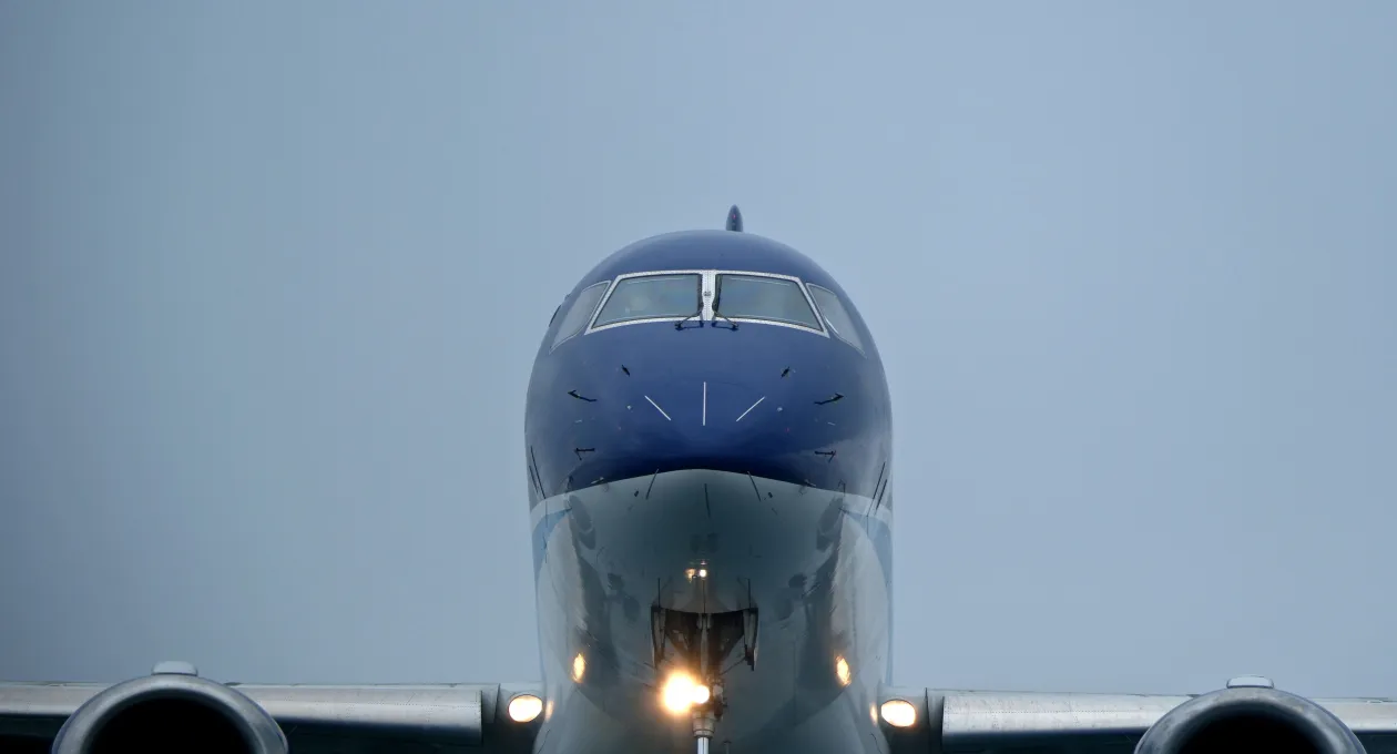 Close-Up of Passenger Jet Nose and Cockpit Windows