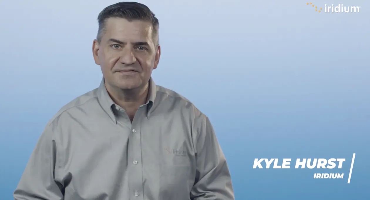 Man introducing an educational series in front of a blue background