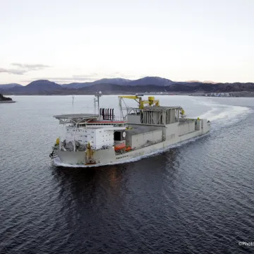 Boats on the water at dusk