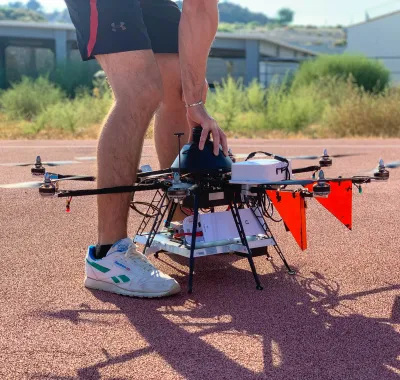 Exploring a vast landscape with a fixed-wing drone, showcasing its efficiency and long-range capability in aerial surveys and geographic mapping for precise environmental analysis.