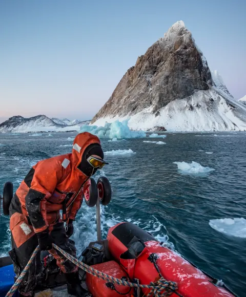 Pontoon cruise in the Arctic fjord - between glaciers, icebergs and mountains
