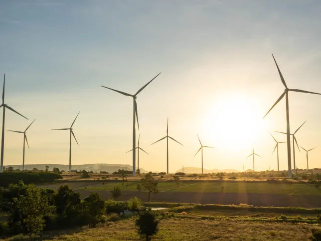 Wind turbines are alternative electricity sources, the concept of sustainable resources, Beautiful sky with wind generators turbines, Renewable energy.