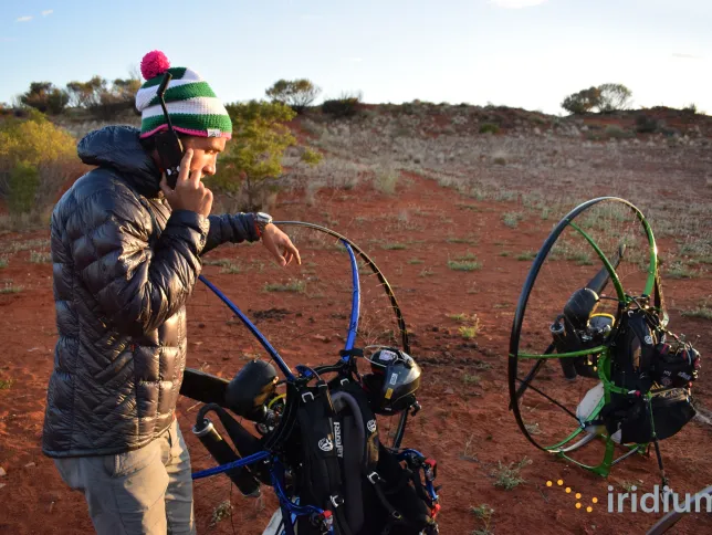 A person using Iridium 9555