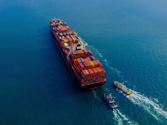 Aerial view of container cargo ship in sea, international export and import services, logistics