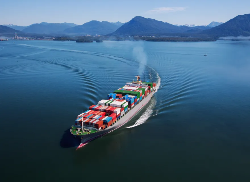Aerial photo of a large loaded container ship.