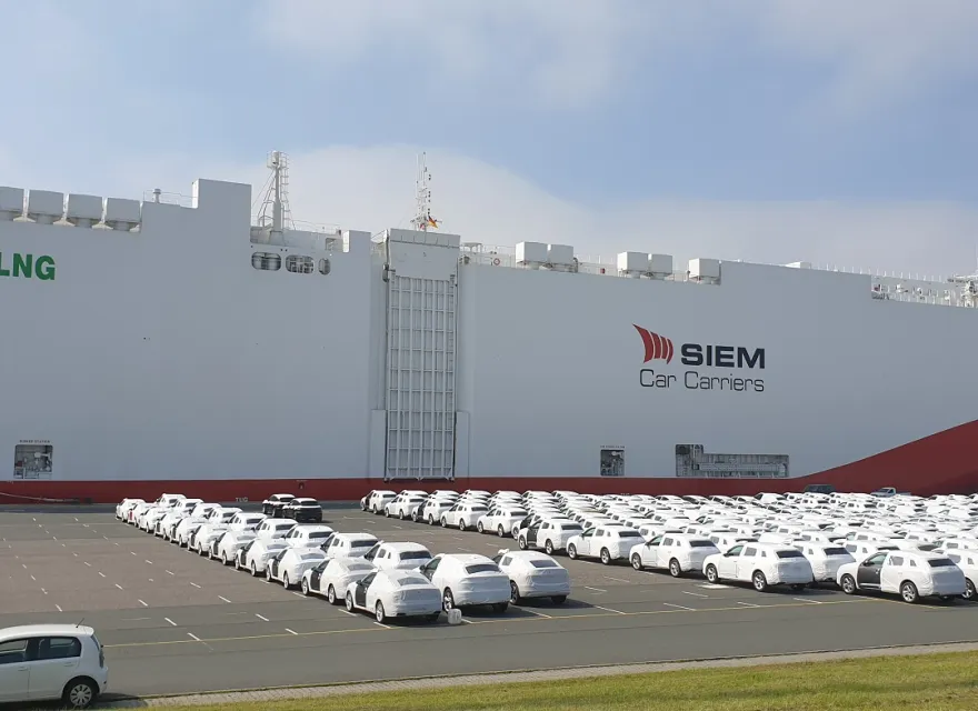 Siem Car Carrier ship featuring cards in the parking lot, waiting to be loaded in.