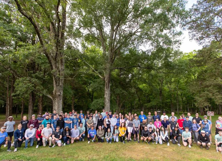 A group of Iridium employees and interns volunteering.