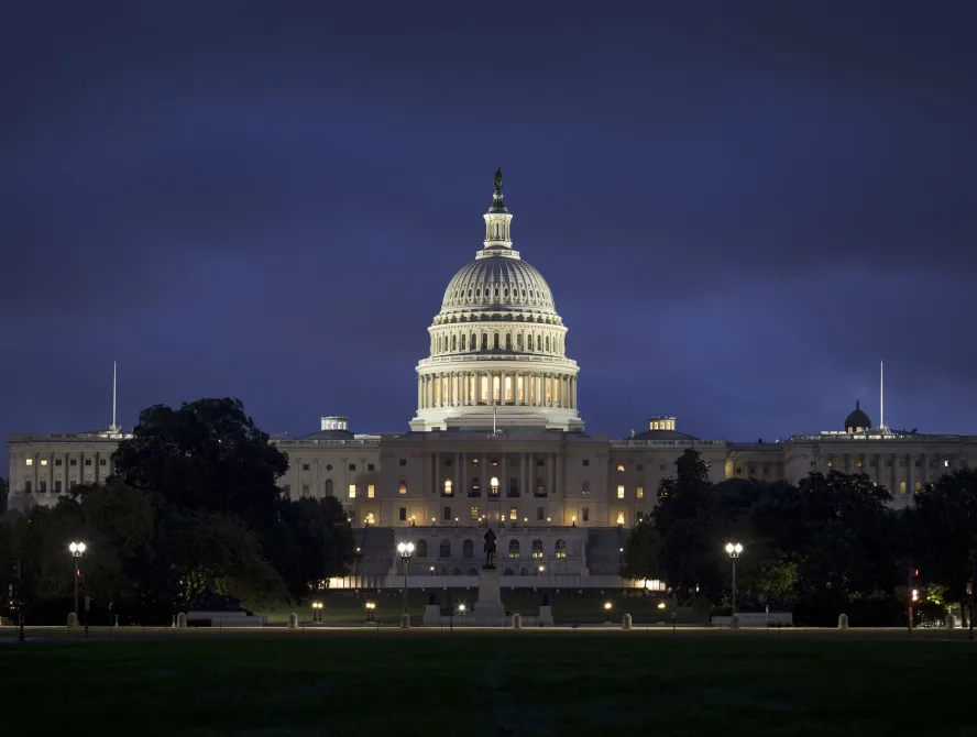 Dark clouds over the US Capitol Building at twilight