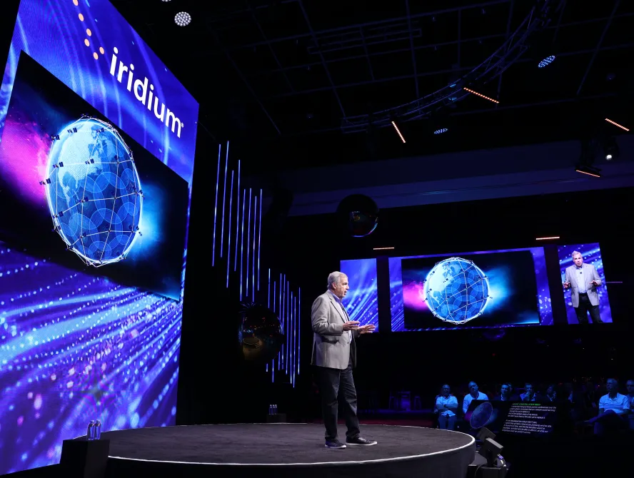 A person gives a speak at the IPC 2025 CEO Speech