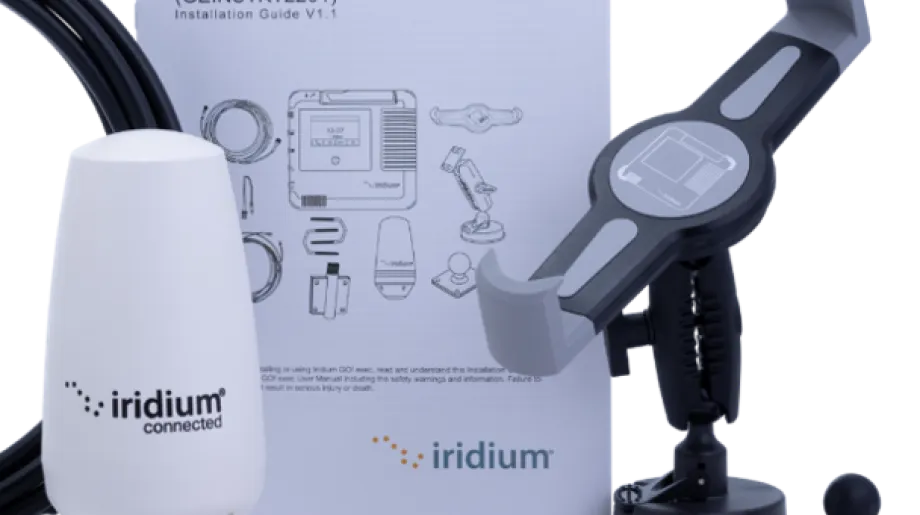 Iridium GO! exec external antenna installation kit, including antenna, mounting hardware, cables, device cradle, and installation guide displayed together.