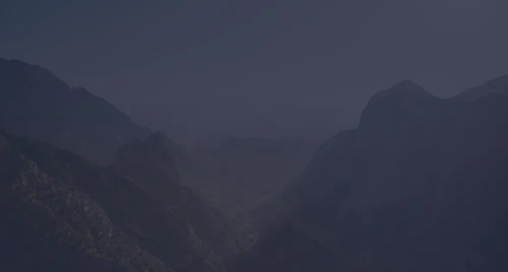 Mountain Scape with a dark blue overlay