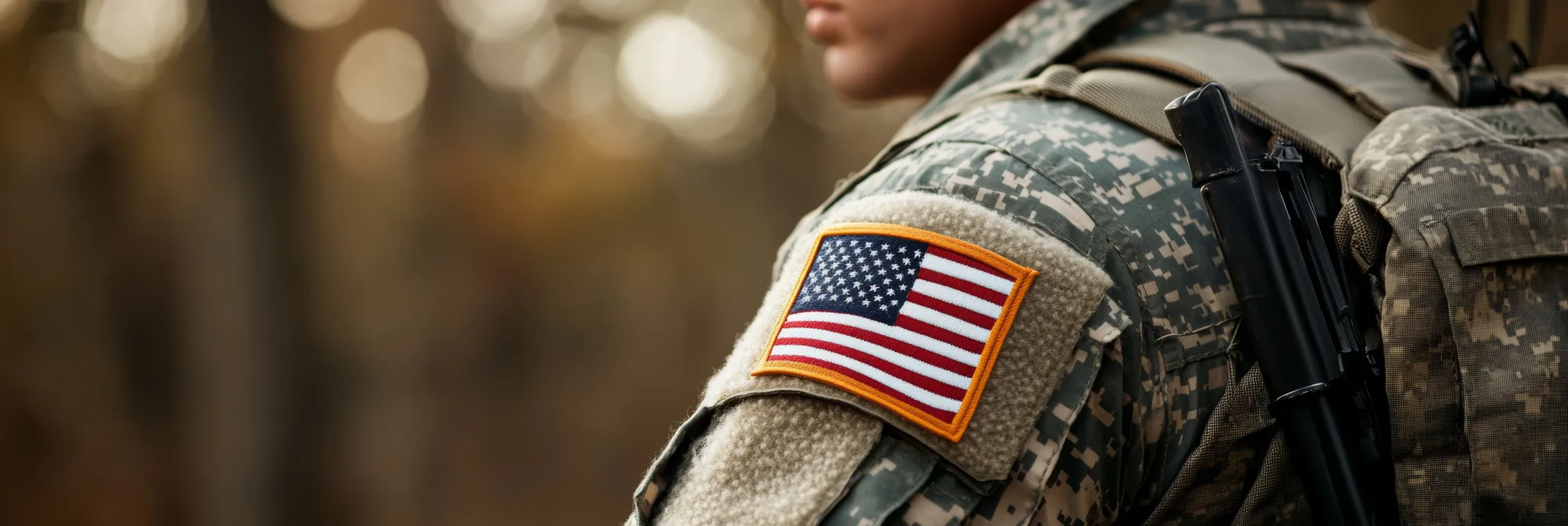 Marching soldiers with the American flag at dawn. A tribute to Veterans Day.