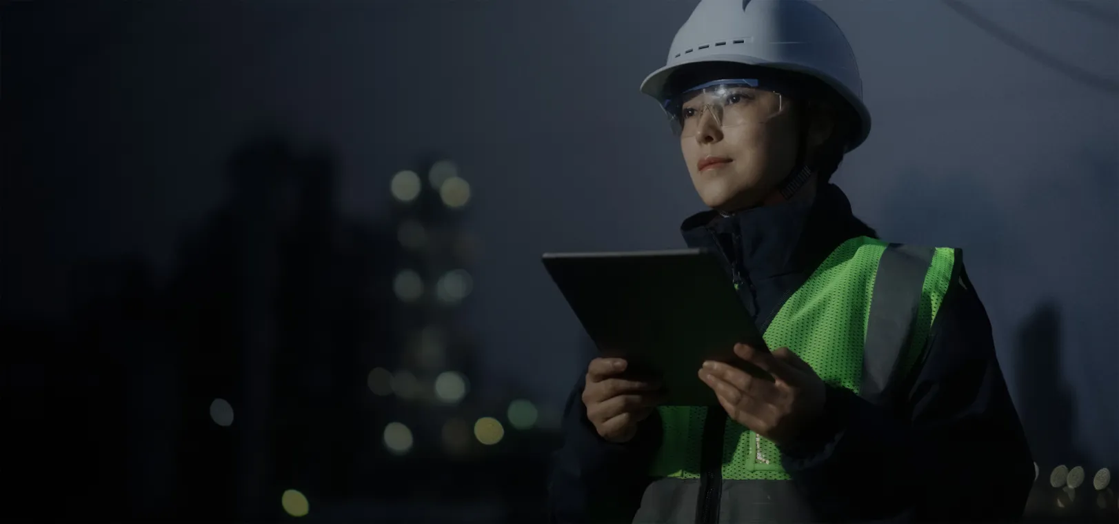 Woman looking over equipment