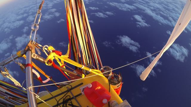 On a World–Record Balloon Journey Across the Pacific with Iridium