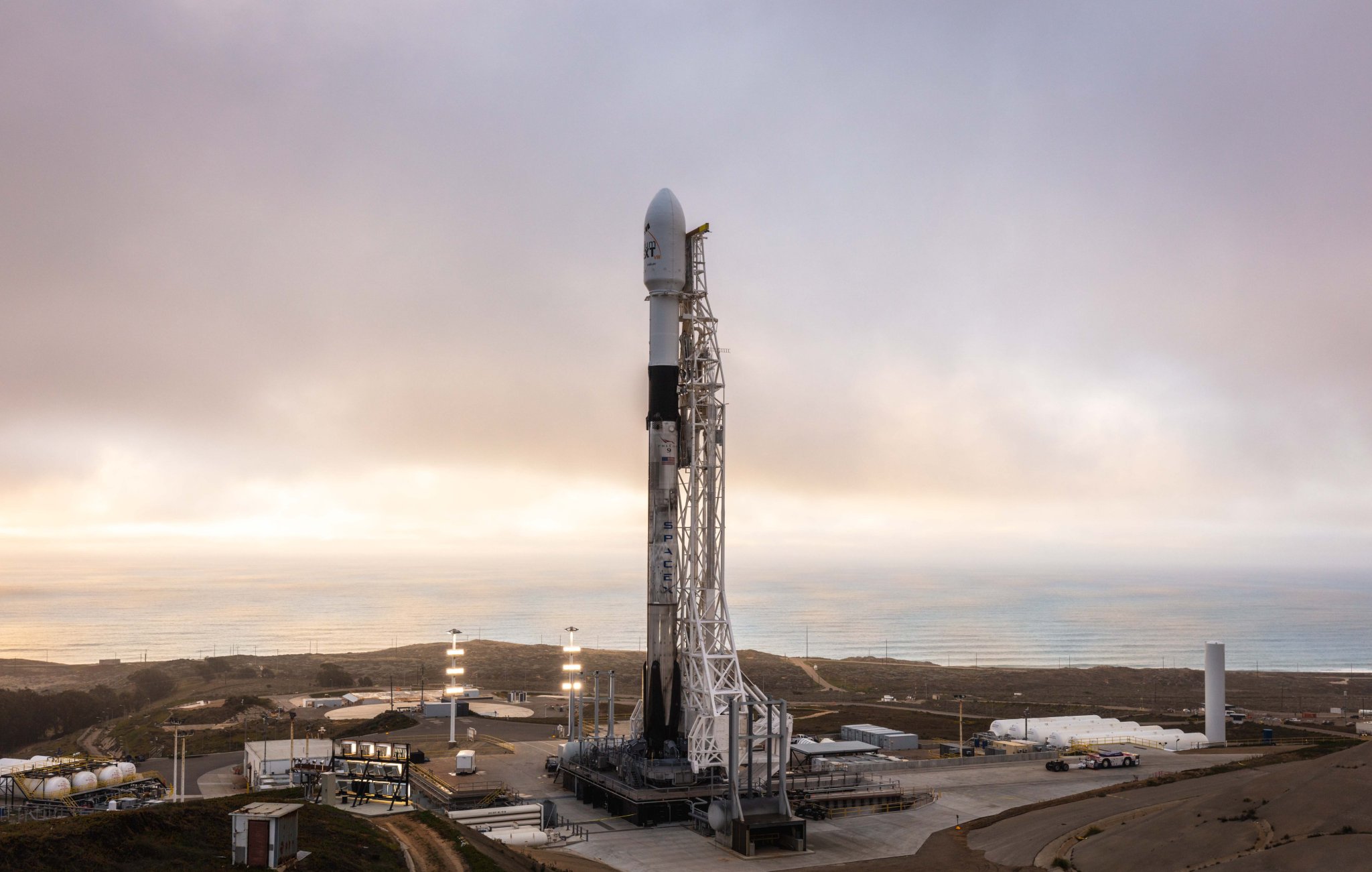 Falcon 9 rocket vertical on SpaceX launch pad 8th Iridium launch.