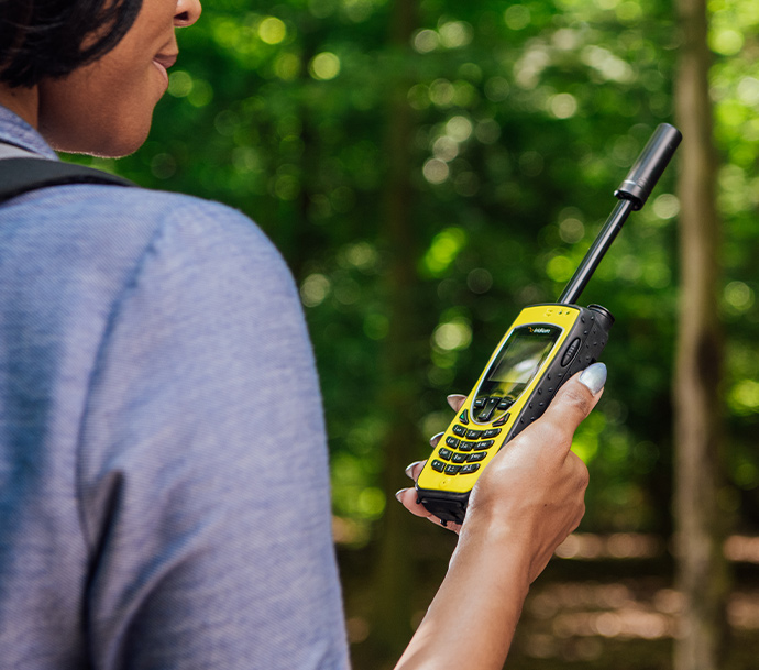 Woman using Iridium Extreme in Safety Yellow