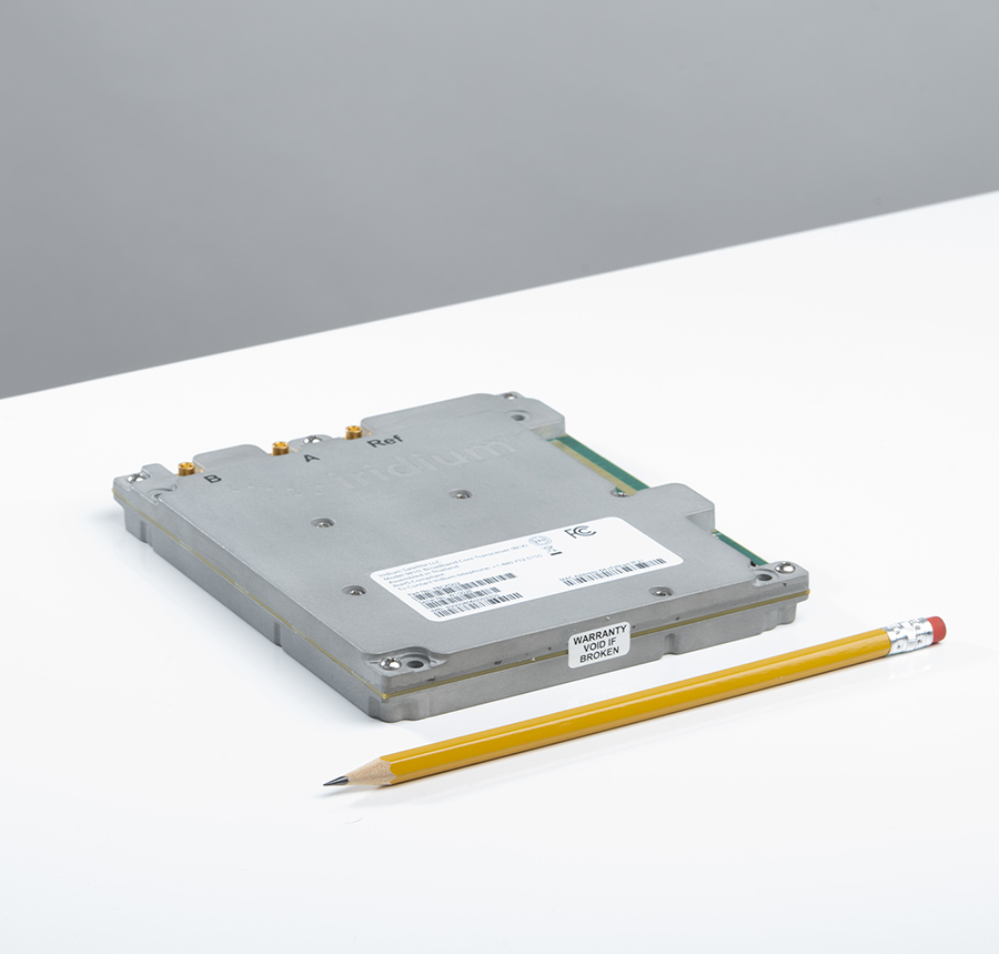 Iridium Certus 9810 module to scale next to pencil