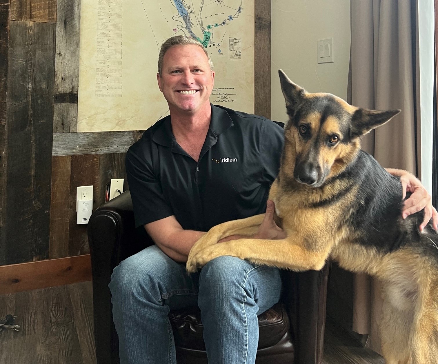 Iridium's David Robinson and his service dog Reggie